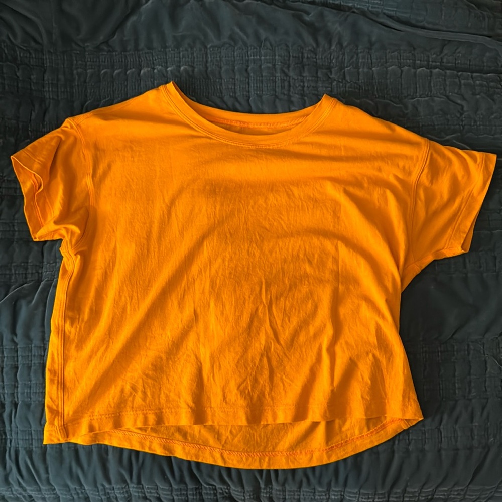 Lululemon Cates T-Shirt 
Size 2 
Color: Clementine